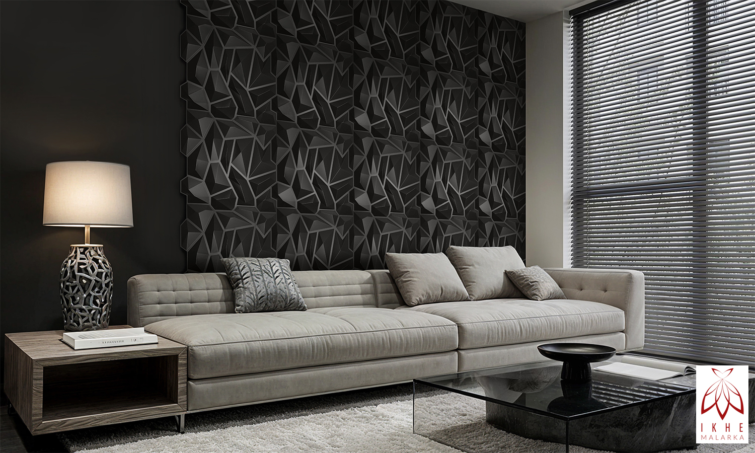 Black wall background behind the gray sofa in a living area.